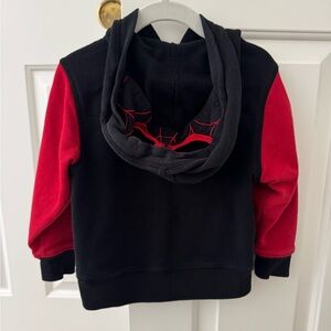 Hanna Andersson Black and Red Spider-Man/Miles Morales red zip up.